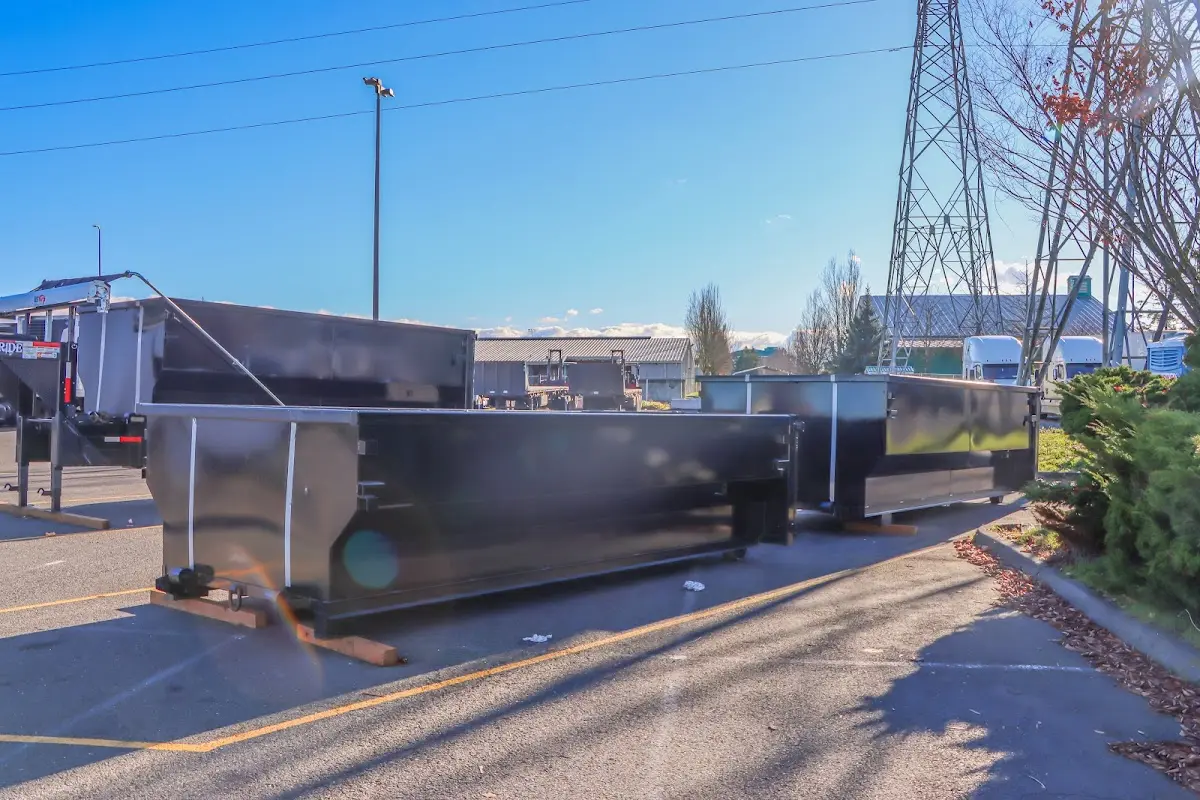 Roll-off dumpster ready for waste disposal at job site for Concrete Dumpster Rental in Hillsboro